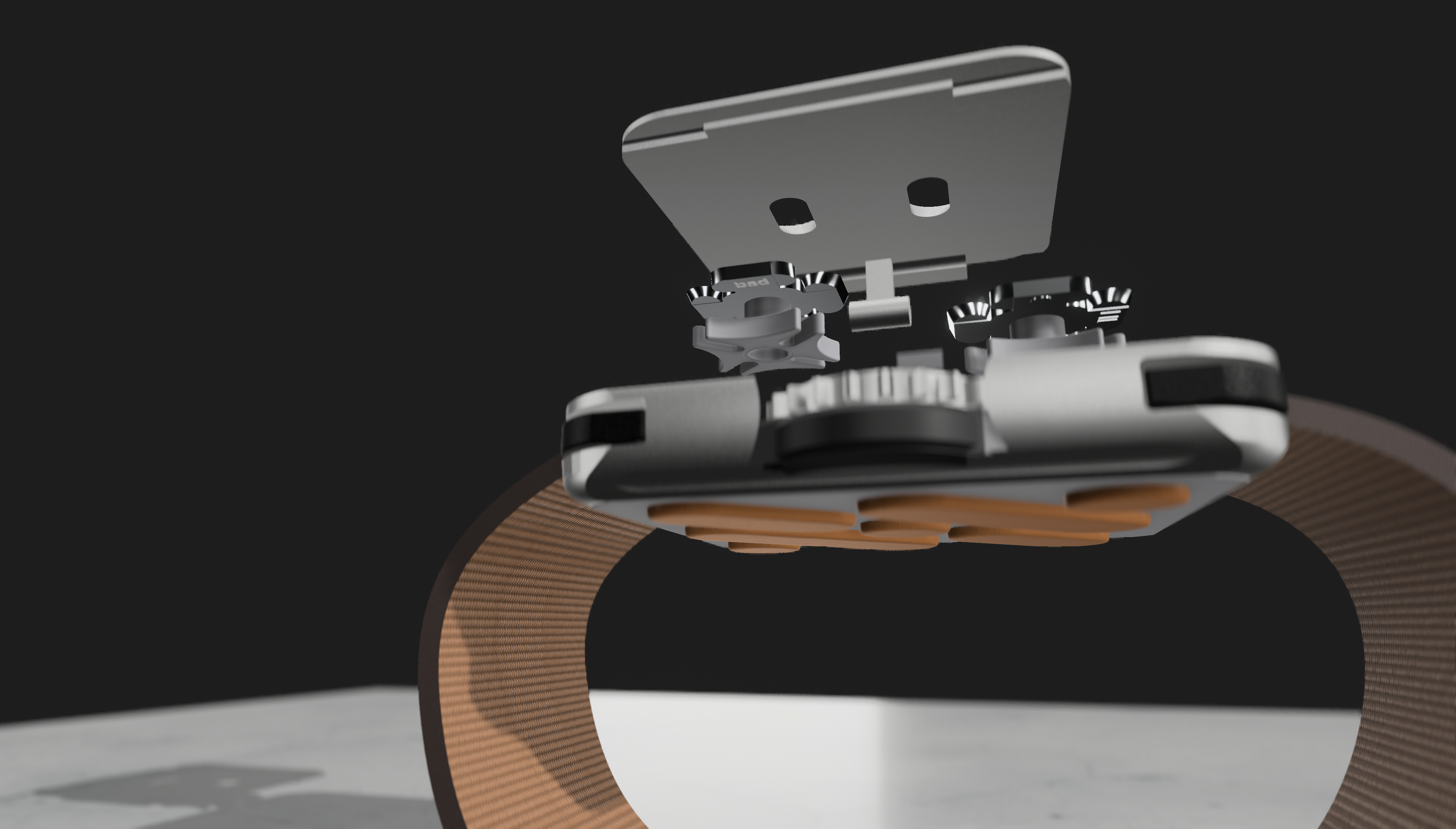 Exploded view of the housing showing two stacked wheels on a shared axis, each carrying its own set of labels